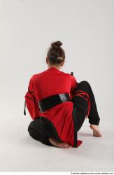 Katerina Ninja Kneeling Pose